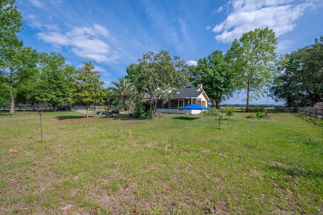 view of yard with fence