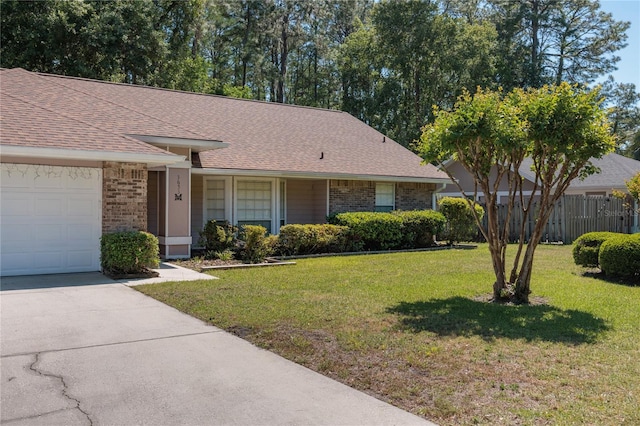 3653 NW 67th Ave, Gainesville, FL 32653 - ranch-style home with fence, a garage, brick siding, a shingled roof, and a front yard
