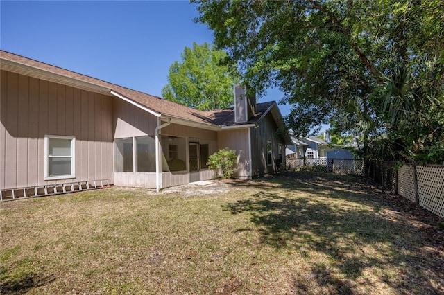 3653 NW 67th Ave, Gainesville, FL 32653 - view of yard with a sunroom and a fenced backyard
