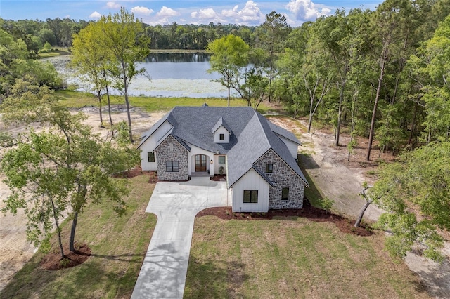 birds eye view of property featuring a water view