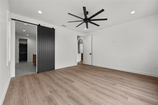 interior space with visible vents, recessed lighting, and light wood-type flooring