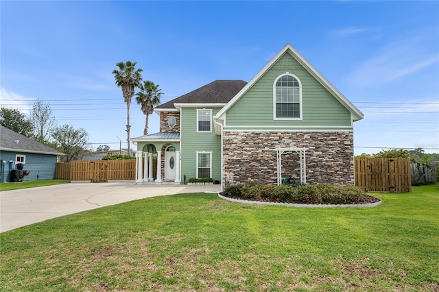 11931 NW 8th Rd, Gainesville, FL 32606 - traditional-style house with stone siding and concrete driveway
