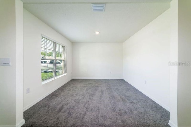 6683 SE 3rd Loop, Ocala, FL 34472 - carpeted spare room featuring baseboards and visible vents
