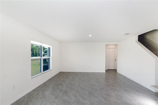 6683 SE 3rd Loop, Ocala, FL 34472 - tiled empty room featuring baseboards, visible vents, and recessed lighting