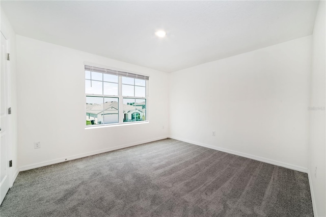 6683 SE 3rd Loop, Ocala, FL 34472 - carpeted spare room with baseboards