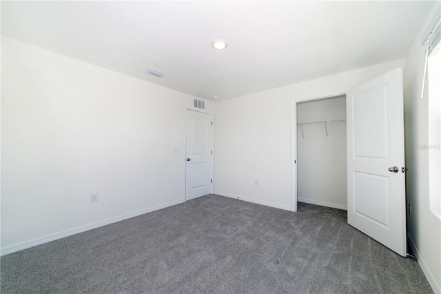 6683 SE 3rd Loop, Ocala, FL 34472 - unfurnished bedroom featuring baseboards, a closet, visible vents, and carpet