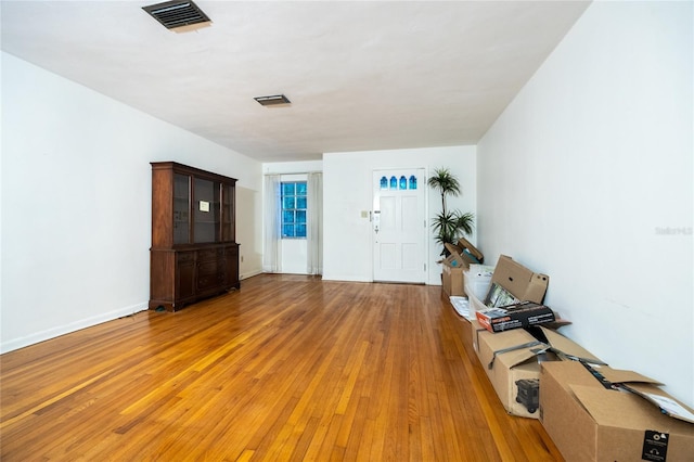 3436 SW 20th St, Gainesville, FL 32608 - foyer featuring visible vents, baseboards, and light wood-style floors