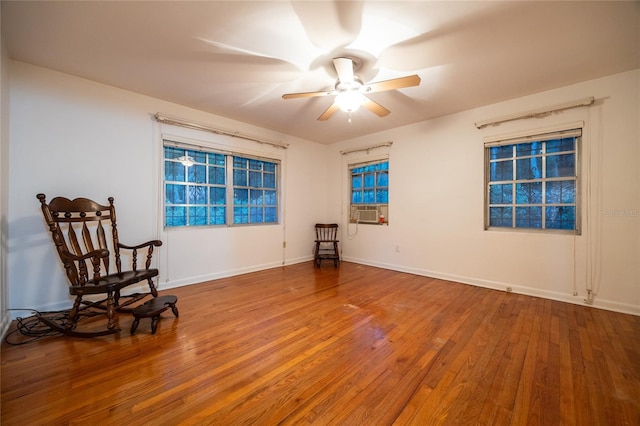3436 SW 20th St, Gainesville, FL 32608 - unfurnished room with baseboards, cooling unit, hardwood / wood-style flooring, and ceiling fan