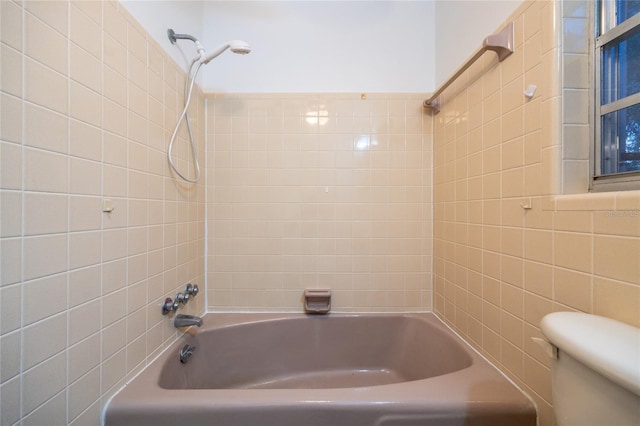 3436 SW 20th St, Gainesville, FL 32608 - full bathroom with toilet, tub / shower combination, and tile walls
