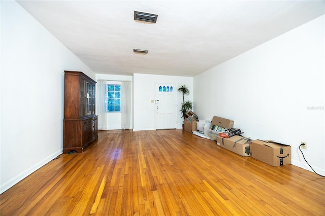 3436 SW 20th St, Gainesville, FL 32608 - foyer with visible vents, light wood-style flooring, and baseboards