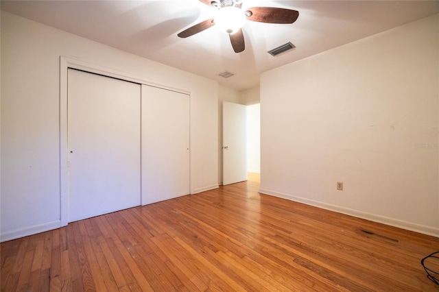3436 SW 20th St, Gainesville, FL 32608 - unfurnished bedroom featuring ceiling fan, visible vents, light wood-type flooring, and a closet