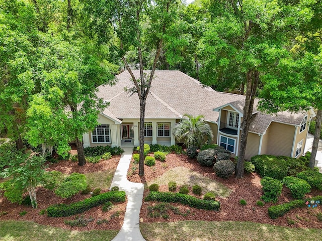 view of front of home featuring a shingled roof