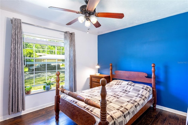 2423 NW 67th Ter, Gainesville, FL 32606 - bedroom with ceiling fan, baseboards, wood finished floors, and multiple windows