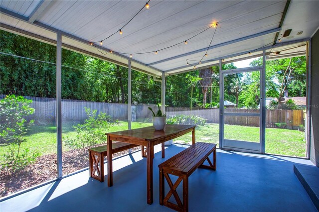 2423 NW 67th Ter, Gainesville, FL 32606 - sunroom / solarium with outdoor dining area