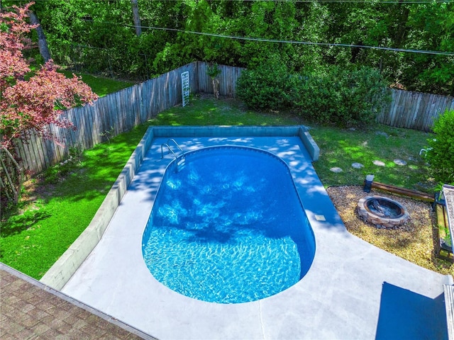 2423 NW 67th Ter, Gainesville, FL 32606 - view of pool featuring a yard, a fenced in pool, and a fenced backyard