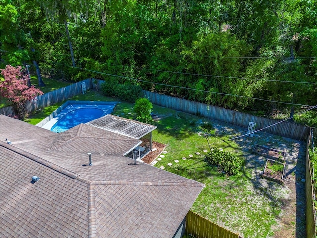 2423 NW 67th Ter, Gainesville, FL 32606 - exterior space with a yard, a fenced in pool, and a fenced backyard