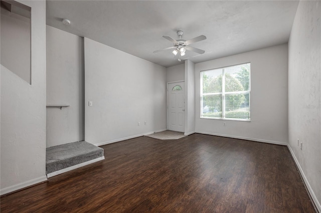 3510 SW 30th Way Unit 158, Gainesville, FL 32608 - unfurnished living room with baseboards, a ceiling fan, and wood finished floors