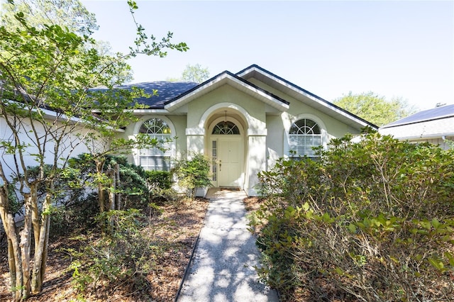 6114 NW 35th St, Gainesville, FL 32653 - property entrance featuring stucco siding
