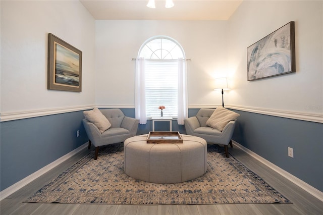 6114 NW 35th St, Gainesville, FL 32653 - sitting room featuring a wealth of natural light, wood finished floors, and baseboards