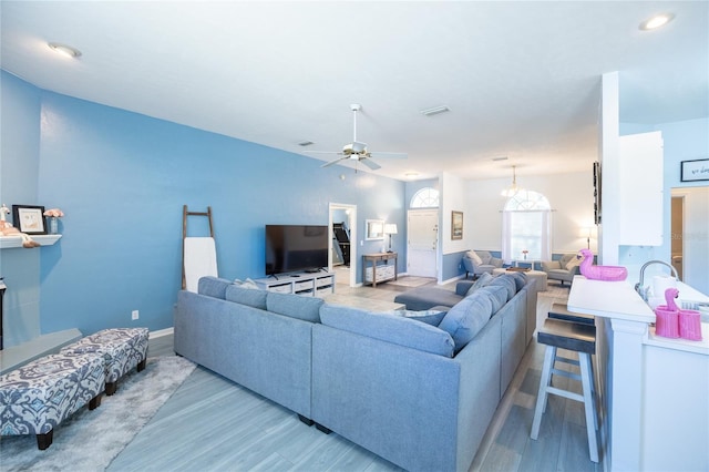 6114 NW 35th St, Gainesville, FL 32653 - living area featuring recessed lighting, a ceiling fan, visible vents, baseboards, and wood finished floors