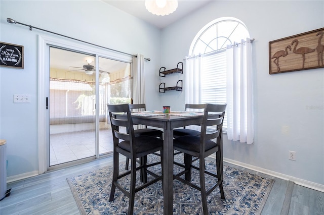 6114 NW 35th St, Gainesville, FL 32653 - dining space featuring baseboards and wood finished floors