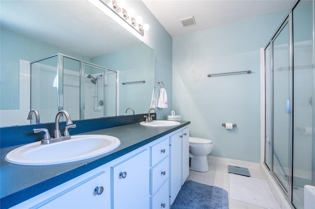 6114 NW 35th St, Gainesville, FL 32653 - bathroom featuring visible vents, a shower stall, and a sink