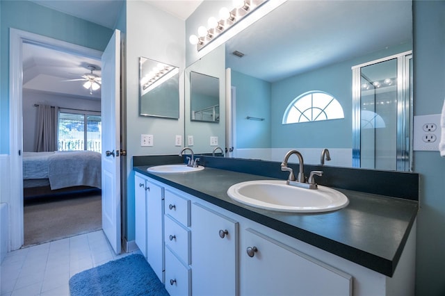 6114 NW 35th St, Gainesville, FL 32653 - bathroom featuring plenty of natural light, a ceiling fan, and a sink