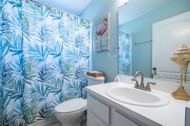 6114 NW 35th St, Gainesville, FL 32653 - bathroom with toilet, a shower with curtain, and vanity
