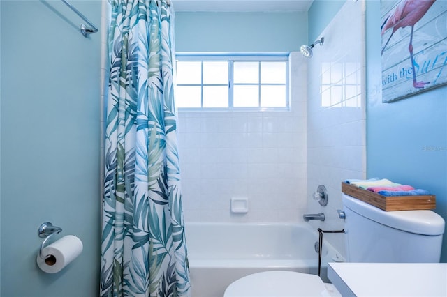 6114 NW 35th St, Gainesville, FL 32653 - bathroom featuring shower / bath combo, toilet, and plenty of natural light
