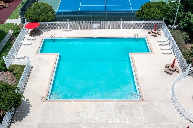 6114 NW 35th St, Gainesville, FL 32653 - community pool featuring fence and a patio area