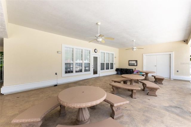 6114 NW 35th St, Gainesville, FL 32653 - living area with ceiling fan, carpet flooring, and baseboards