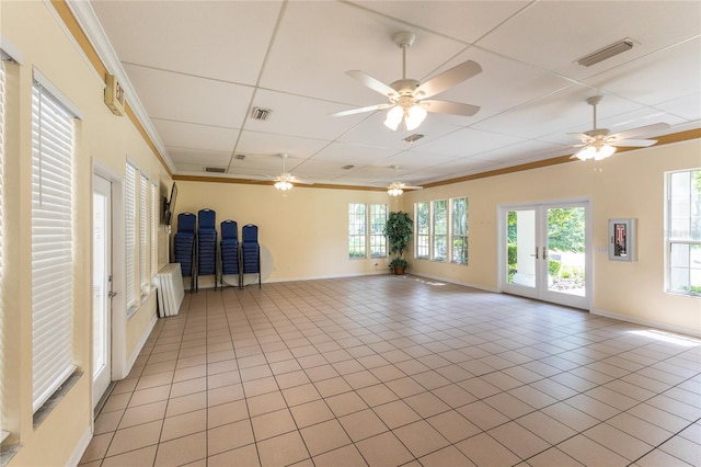 6114 NW 35th St, Gainesville, FL 32653 - empty room featuring ornamental molding, visible vents, and a wealth of natural light
