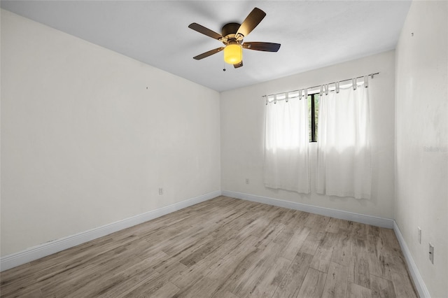 507 NW 39th Rd Unit 317, Gainesville, FL 32607 - empty room featuring light wood-style floors, baseboards, and ceiling fan