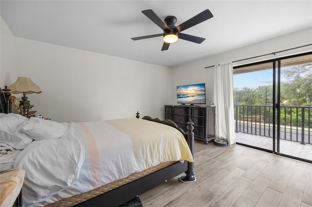 507 NW 39th Rd Unit 317, Gainesville, FL 32607 - bedroom featuring access to outside, light wood finished floors, and ceiling fan