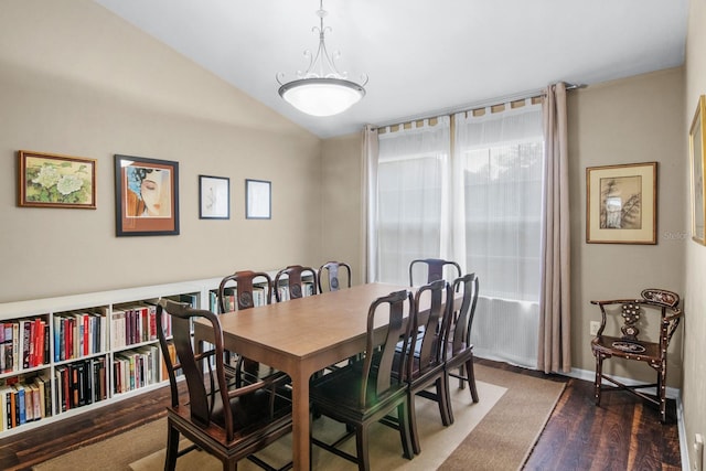8145 SW 51st Rd, Gainesville, FL 32608 - dining room featuring wood finished floors and vaulted ceiling