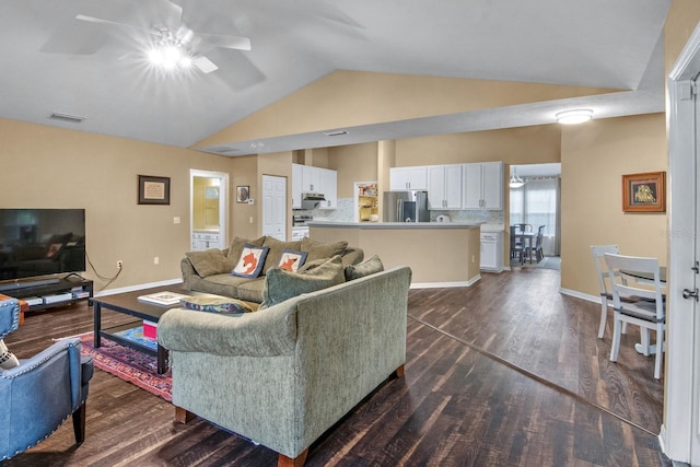 8145 SW 51st Rd, Gainesville, FL 32608 - living area featuring vaulted ceiling, ceiling fan, dark wood-type flooring, and baseboards