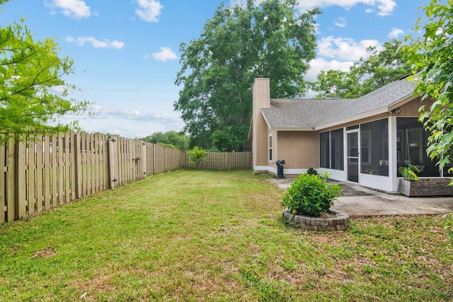 8145 SW 51st Rd, Gainesville, FL 32608 - view of yard featuring a sunroom and a patio