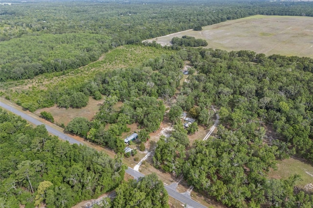 bird's eye view featuring a forest view