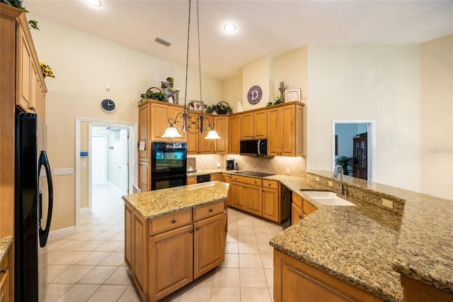 10312 SW 23rd Ave, Gainesville, FL 32607 - kitchen featuring a sink, black appliances, decorative backsplash, high vaulted ceiling, and light stone counters