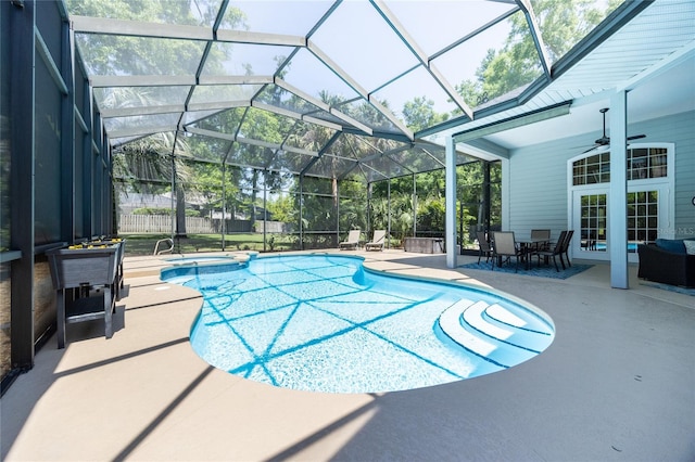 10312 SW 23rd Ave, Gainesville, FL 32607 - view of pool featuring a patio area, a pool with connected hot tub, a ceiling fan, and glass enclosure