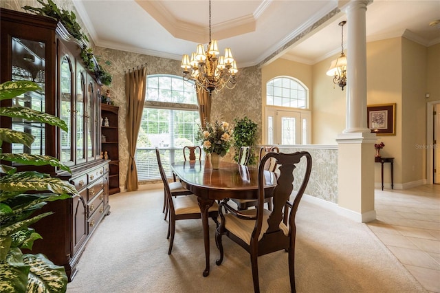 10312 SW 23rd Ave, Gainesville, FL 32607 - dining room with decorative columns, light colored carpet, wallpapered walls, a raised ceiling, and baseboards