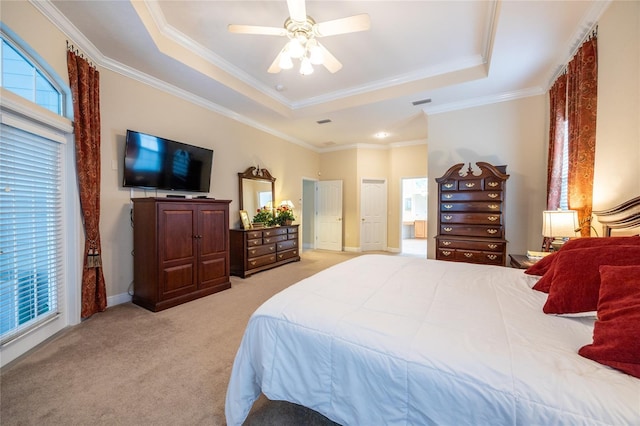 10312 SW 23rd Ave, Gainesville, FL 32607 - bedroom with a raised ceiling, light carpet, ornamental molding, ceiling fan, and baseboards