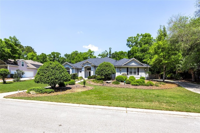 10312 SW 23rd Ave, Gainesville, FL 32607 - view of front of house featuring a front yard