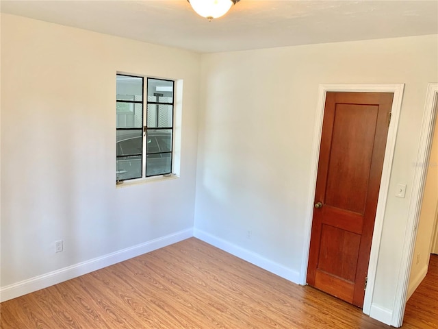 1041 NE 10th Ave, Gainesville, FL 32601 - spare room with light wood finished floors and baseboards
