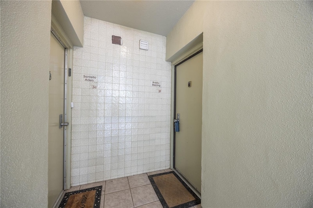 interior space with tile patterned flooring