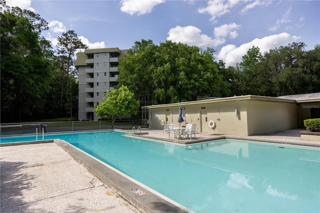community pool with fence