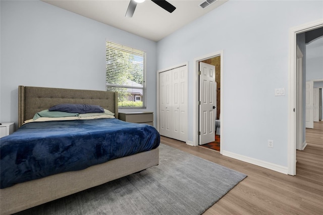 4606 SW 97th Ter, Gainesville, FL 32608 - bedroom with wood finished floors, baseboards, and ceiling fan