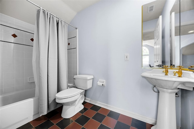 4606 SW 97th Ter, Gainesville, FL 32608 - bathroom with toilet, shower / tub combo with curtain, tile patterned floors, and baseboards