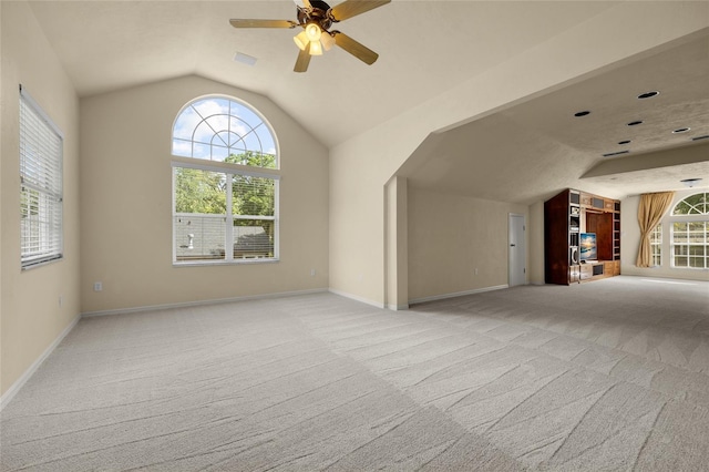 4606 SW 97th Ter, Gainesville, FL 32608 - bonus room featuring light carpet, vaulted ceiling, plenty of natural light, ceiling fan, and baseboards