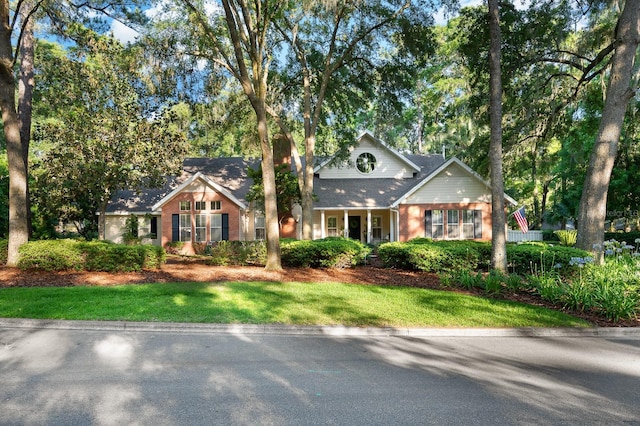 4319 SW 86th Way, Gainesville, FL 32608 - view of front facade featuring brick siding